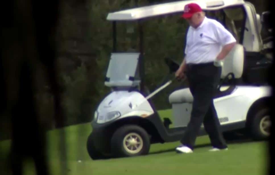 Trump caught enjoying golf on Christmas Eve when the White Home claims he works 1 Trump caught playing golf on Christmas Eve when the White House claims he works