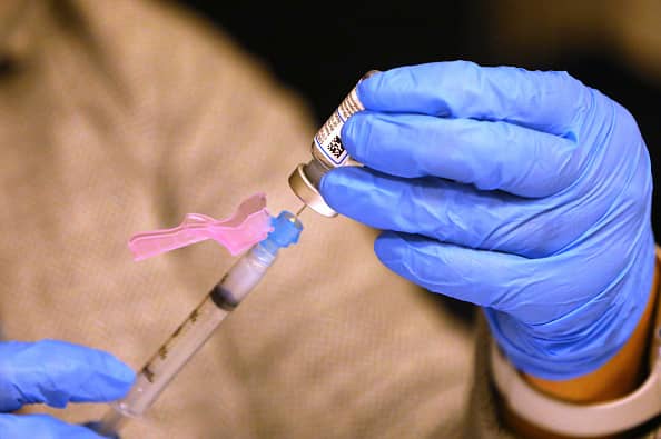 Covid-19 vaccine passports are an investment in the future, not now