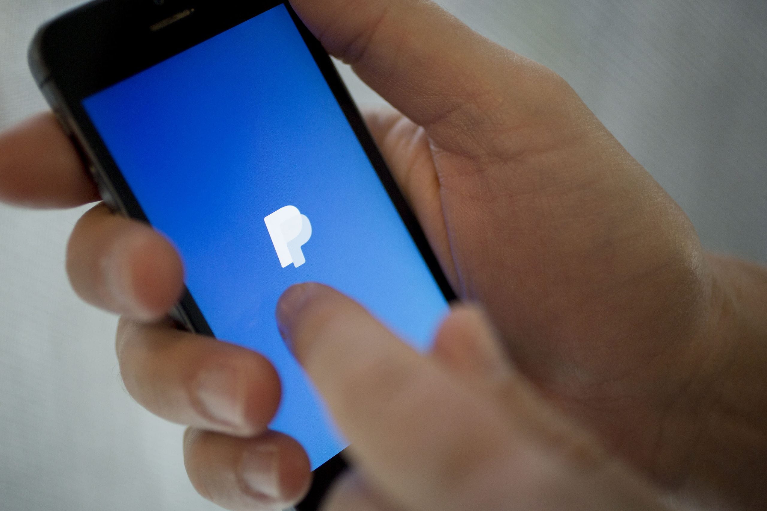 PayPal's CFO says the company is unlikely to invest cash in cryptocurrencies