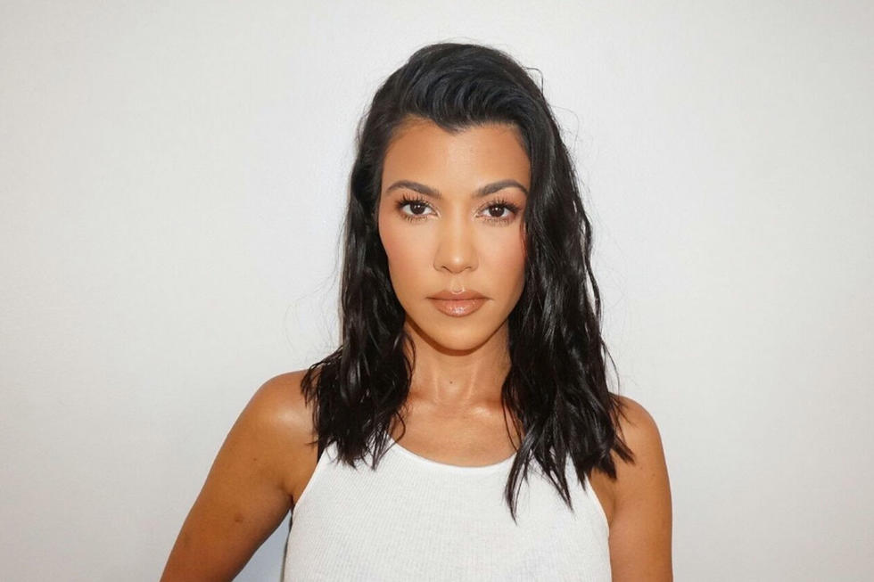 Kourtney Kardashian is spotted with Travis Barker as dating rumors continue to swirl