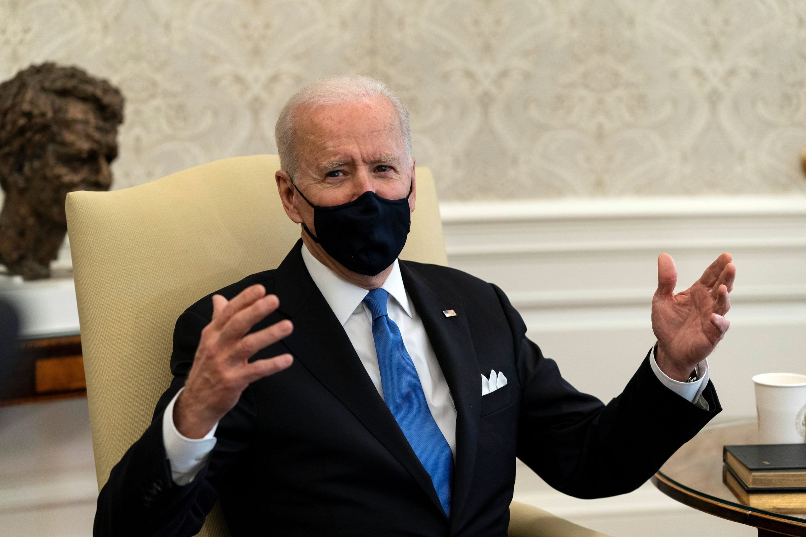 Biden slams governors for lifting mask mandates, calling it "Neanderthal thinking".