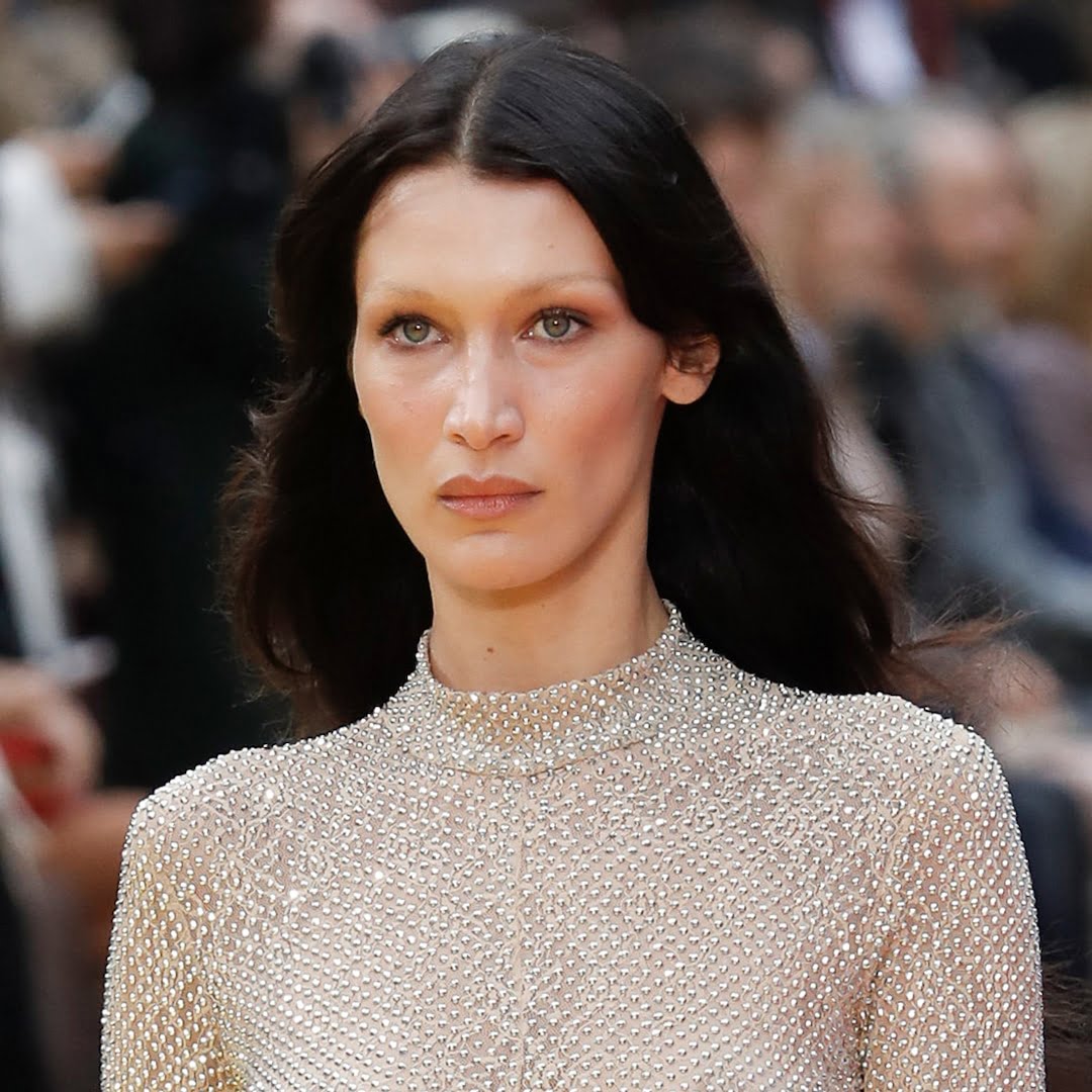 Bella Hadid sizzles in a sexy sheer catsuit at Paris Fashion Week