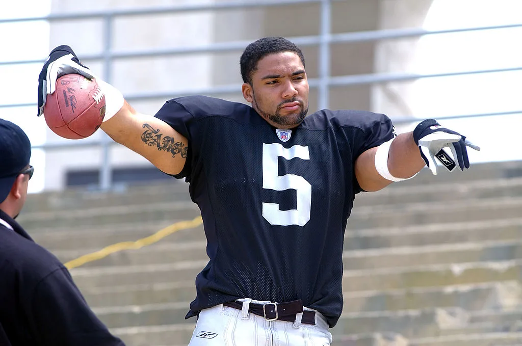 Ex-NFL star accuses 'racist' boss of molesting him for sex